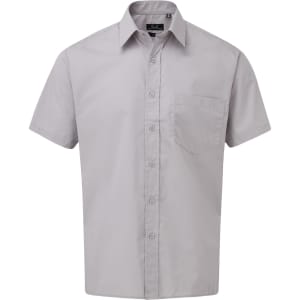 A short-sleeved button-up shirt in a light grey colour with a single pocket and a logo.