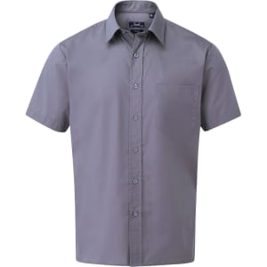 A short-sleeved poplin shirt in grey with a button-up front and a single chest pocket. It features a logo.