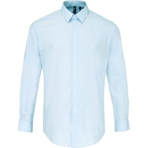 Light blue button-up shirt with long sleeves and a collar, featuring a logo on the chest.