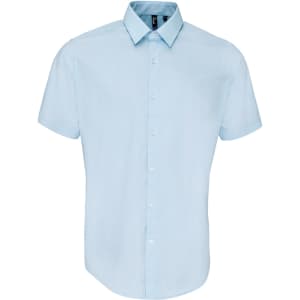 A short-sleeved, button-up shirt in light blue, featuring a collar and a logo.