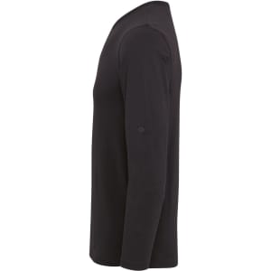 A black long sleeve tee with roll sleeves and a logo on the sleeve. Side view showcasing the fit.
