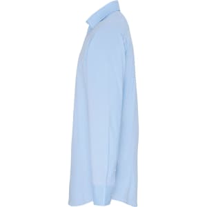 A light blue button-up shirt in cotton poplin fabric displayed from the side, featuring long sleeves and a collar.