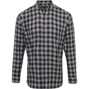 A button-up shirt in black and grey check pattern featuring a collar and long sleeves. The shirt has a logo.