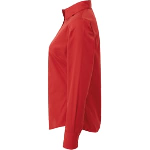 A red women's poplin long sleeve blouse with a button-up collar and sleeve cuffs, featuring a branding logo.
