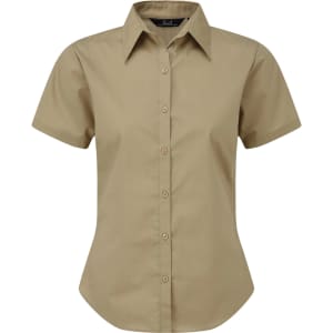 A women's short-sleeve poplin blouse in khaki with a button-up front and a collar. It features a logo.