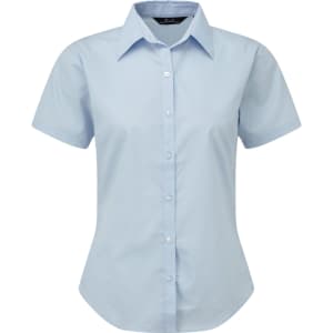 Light blue women's button-up blouse with short sleeves and a collared neckline, featuring a logo on the label.