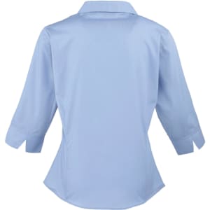 A light blue women's 3/4 sleeve poplin blouse with a button-up design and a collar, featuring a fitted shape.