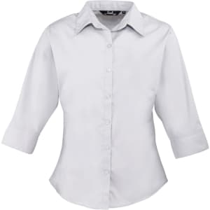 A light grey women's 3/4 sleeve poplin blouse with a button-up front and a collar. It features a branding logo.