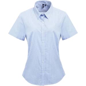 A short-sleeved button-up shirt in light blue with a microcheck pattern, featuring a collared neckline and buttons.
