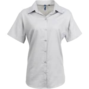 A light grey button-up shirt with a collared neckline and short sleeves. It features a logo on the chest area.