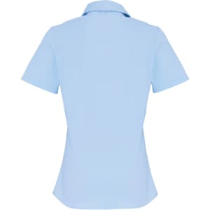 A light blue women's short-sleeve button-up shirt with a fitted design and a collar, featuring a logo.