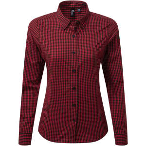 A button-up women's shirt featuring a red and black check pattern with a collar and long sleeves. It has a logo.