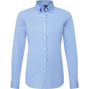 A light blue women's long sleeve shirt featuring a button-down collar and a logo.
