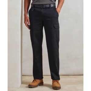Black cargo trousers featuring multiple pockets, worn with a grey top and brown footwear. The trousers have a logo detail.