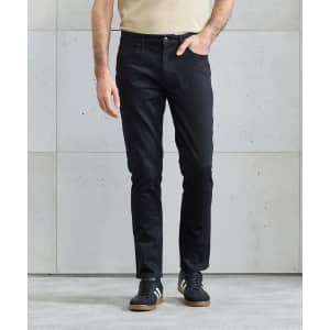 Black straight-leg jeans displayed on a model against a light grey background, featuring a branding logo.