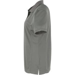 A grey women's polo shirt is displayed from the side, featuring a classic collar and short sleeves. It has a logo.