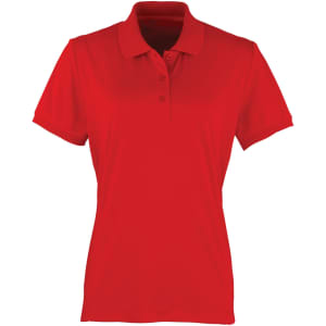 A red women's polo shirt with a classic collar and short sleeves, featuring a logo.