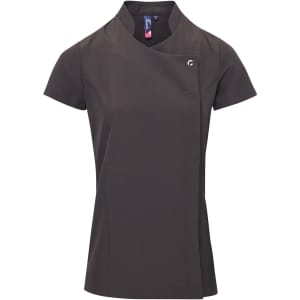 A brown tunic with a stylish neckline and short sleeves, featuring a logo on the side. Perfect for beauty and spa professionals.
