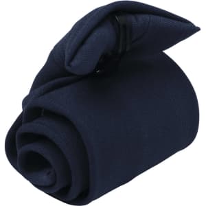 A rolled navy tie secured with a clip, featuring a sleek and simple design.