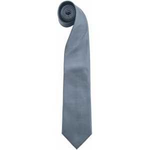 A light blue tie rolled neatly, featuring a smooth texture and a pointed end, with a logo present.