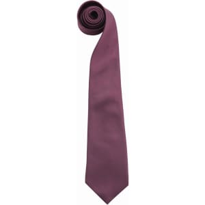 A maroon tie, neatly rolled, featuring a smooth texture and a pointed tip. It has a logo on the fabric.