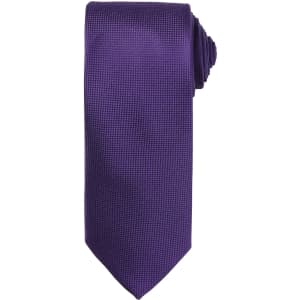 A purple micro waffle tie with a textured pattern and a rounded end, featuring a logo.
