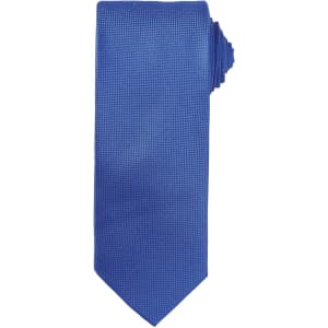 A blue micro waffle tie featuring a textured pattern and a pointed end. The tie has branding visible.