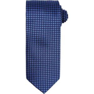 A blue tie featuring a houndstooth pattern, rolled neatly for display. It has branding on the label.