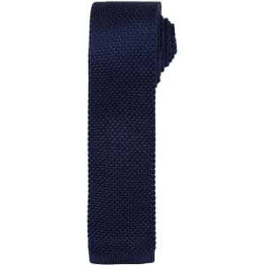 A slim knitted tie in a deep navy blue colour, featuring a textured pattern and a branding logo.