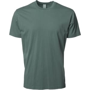 A green Premium Pigment Dye T-Shirt displayed against a plain background, featuring a simple design and branding.