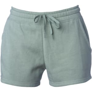 A pair of women's sweatshorts in a soft green colour with an elastic waistband and drawstring.