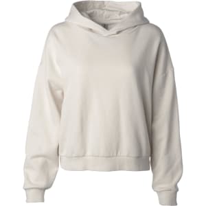 A cream-coloured hoodie with a relaxed fit and large hood, featuring a simple design and no visible branding.