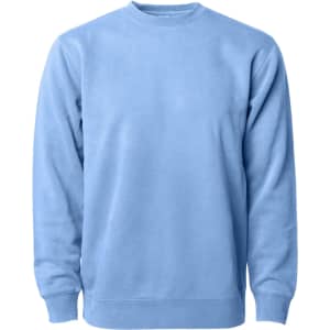 A unisex crew sweatshirt in a light blue colour, featuring long sleeves and a classic round neckline. It has a logo on it.