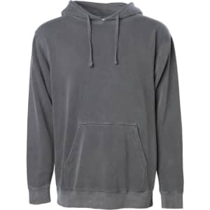 A unisex pigment dye pullover hoodie in a muted grey colour with a front pocket and a drawstring hood.