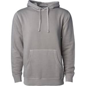 A unisex pigment dye pullover in a soft grey hue, featuring a hood and front pocket. It has branding on the label.