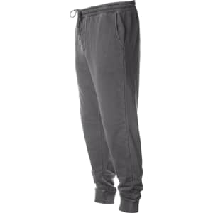 A pair of grey pigment dye sweatpants with a drawstring and side pockets, featuring an elasticated waistband and cuffs.