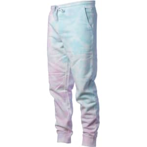 A pair of men's tie dye sweatpants in pastel blue and pink shades, featuring a drawstring waist and cuffed ankles.