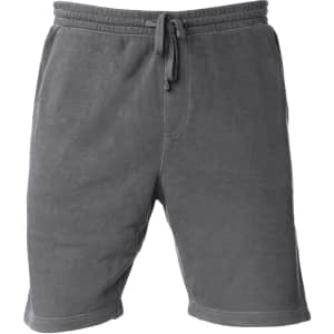 A pair of grey pigment-dyed sweatshorts with an elastic waistband and drawstring detail.