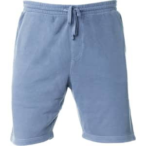 Men's sweatshorts in a soft blue pigment dye, featuring an elastic waistband and drawstring. Includes a logo.