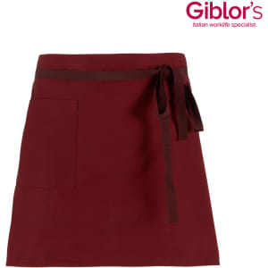 A burgundy apron featuring a waist tie and a front pocket. It has a logo in the top corner.