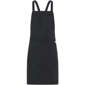 A black apron with two front pockets and a brand logo, featuring long adjustable straps.