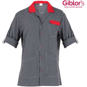 A short-sleeved shirt featuring a black and white check pattern with red accents and a pocket. It has a logo.