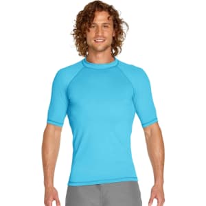 A light blue short sleeve rashie with a snug fit and raglan sleeves, featuring a logo.