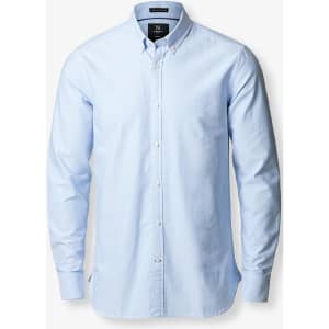 A light blue button-up shirt with long sleeves and a collar, featuring a logo on the front.