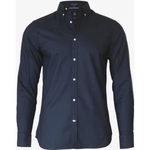 A navy blue slim fit button-up shirt for men with a collar and long sleeves, featuring small buttons and a logo.