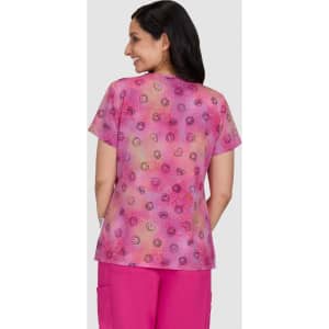 A short-sleeved top featuring a vibrant pink and purple pattern, with a soft fabric and a logo on the back.