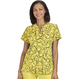 A vibrant yellow top featuring a playful pattern of smiles and abstract shapes, with a simple neckline.