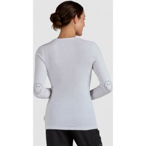 A long-sleeved, light grey top featuring smiley face designs on the elbows. The back view highlights its fitted style.