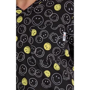 A patterned top featuring yellow and white smiley faces on a black background, with a pocket and a logo tag.
