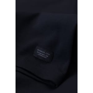 A dark blue men's t-shirt featuring a branding label on the sleeve. The fabric appears smooth and comfortable.